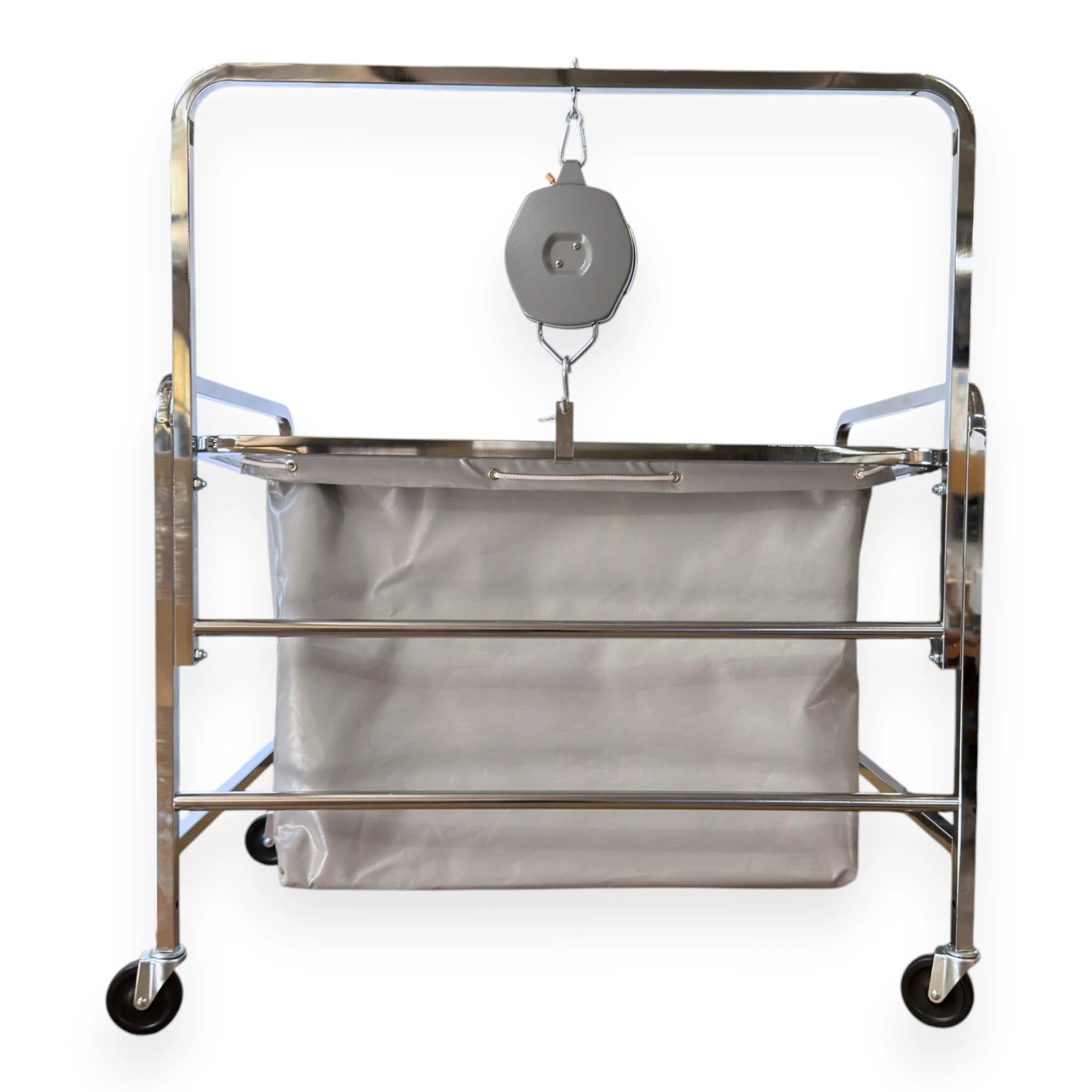 S70 industrial laundry scale rear view showing back of Newhouse dial scale head chrome tubular frame vinyl liner and hand pull rails