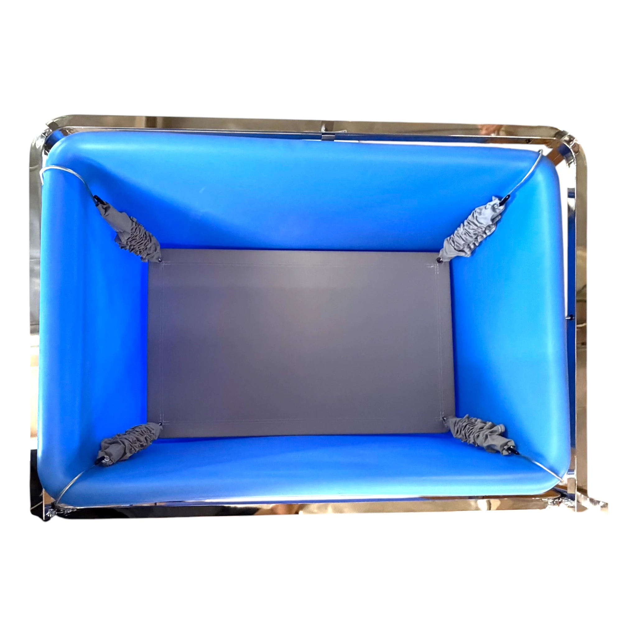 SLIFT2 spring lift platform installed inside S70PL laundry scale basket showing suspended vinyl platform with four corner spring hooks in place