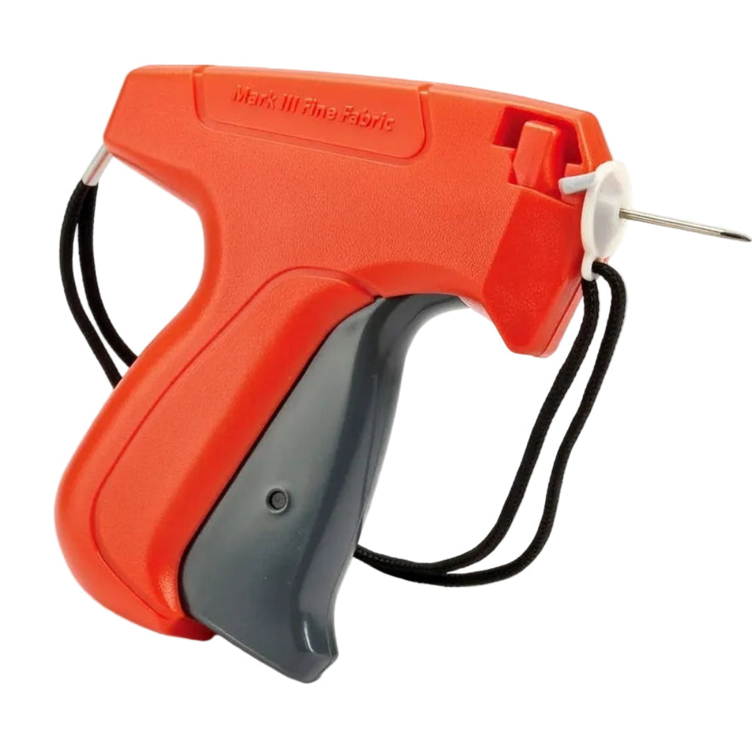 Avery Dennison orange and gray fine fabric tagging gun with a fine needle for delicate garments
